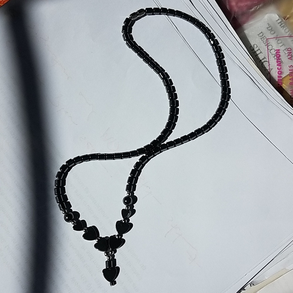 Metal Heart Necklace in a grayish black metal